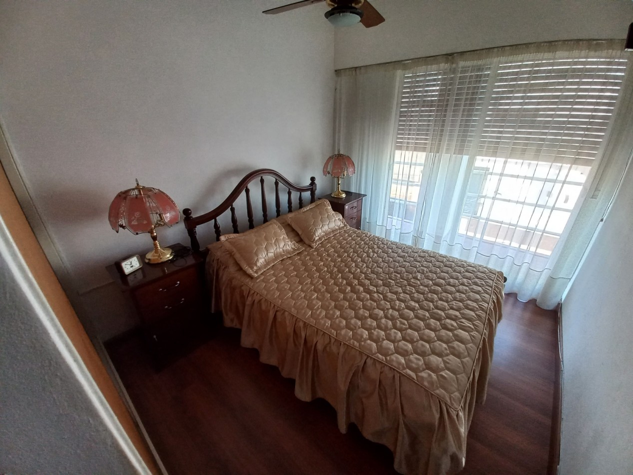 Departamento de dos dormitorios con cochera en Pellegrini 303