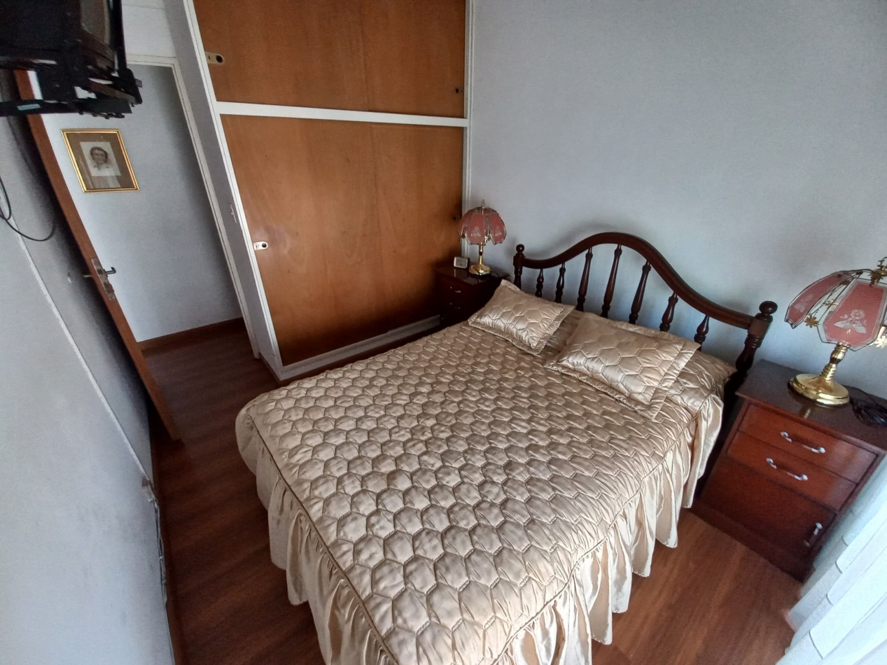 Departamento de dos dormitorios con cochera en Pellegrini 303