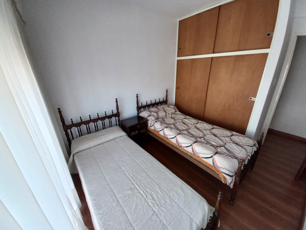 Departamento de dos dormitorios con cochera en Pellegrini 303