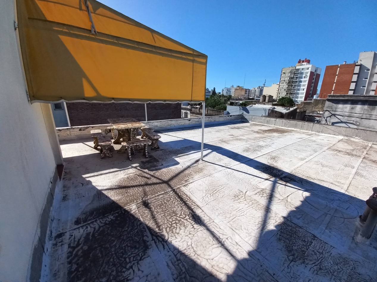 Departamento de dos dormitorios con cochera en Pellegrini 303