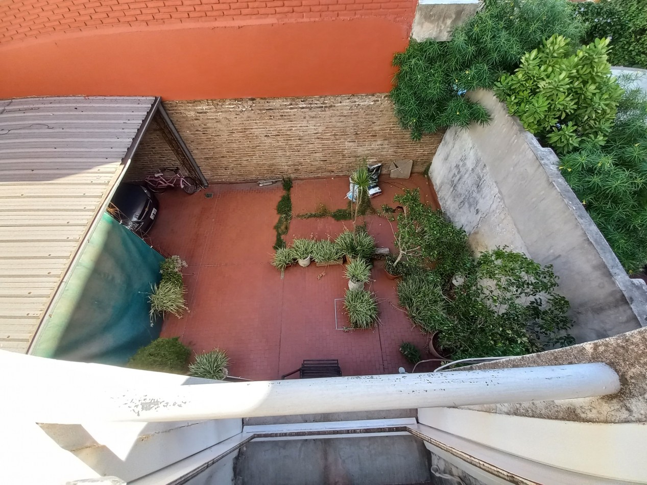Departamento de dos dormitorios con cochera en Pellegrini 303