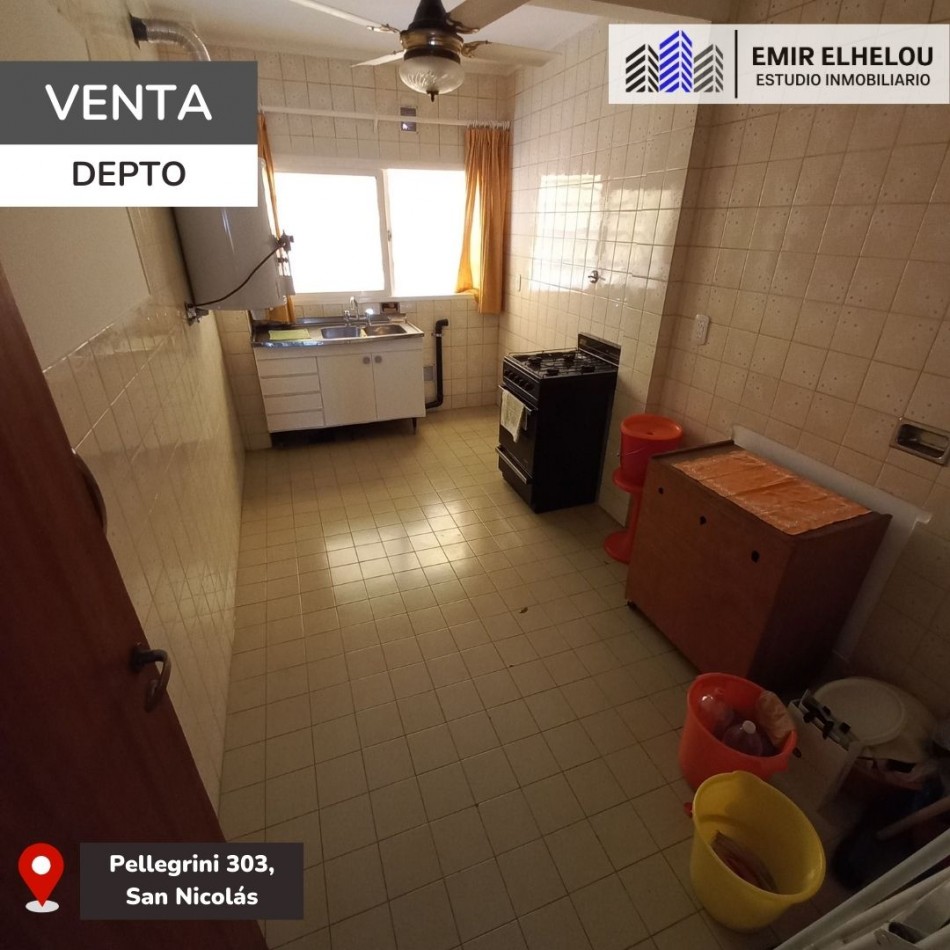 Departamento de dos dormitorios con cochera en Pellegrini 303