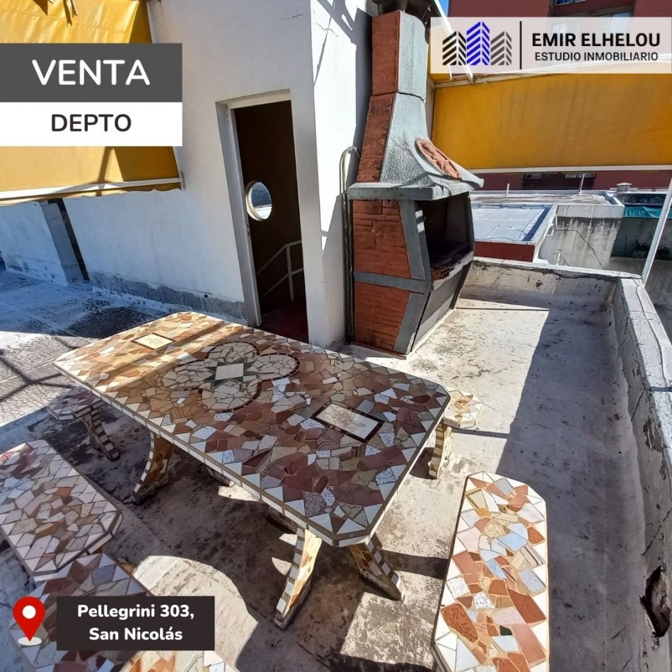 Departamento de dos dormitorios con cochera en Pellegrini 303