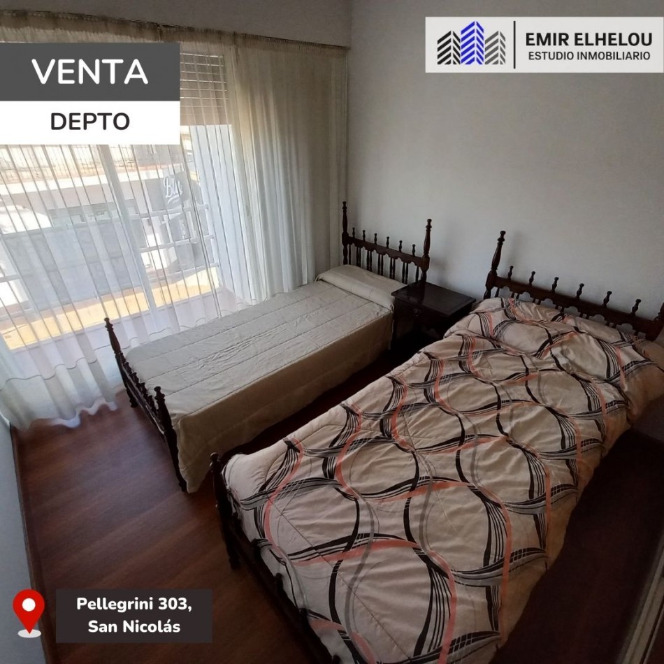 Departamento de dos dormitorios con cochera en Pellegrini 303
