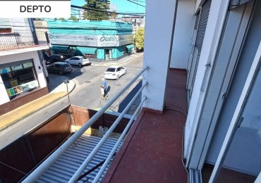 Departamento de dos dormitorios con cochera en Pellegrini 303
